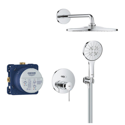 GROHE Essence concealed shower system in Chrome laid out as a set: round rain head on its wall arm, round hand shower on the wall outlet, circular single-lever trim plate and the blue Rapido SmartBox rough-in valve