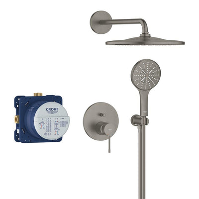 GROHE Essence concealed shower system in Anthracite: round rain head on a wall arm, round single-lever trim plate, hand shower in its wall holder, shown with the blue GROHE Rapido SmartBox rough-in body.