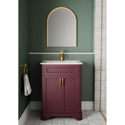 Arc Brushed Brass LED mirror in bathroom