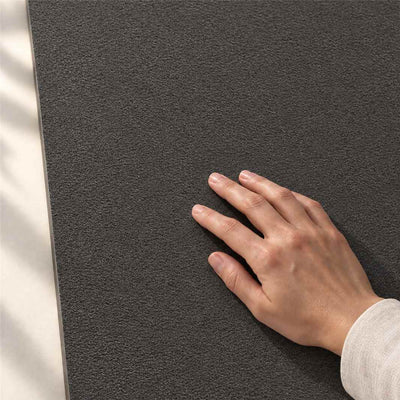 Archicross Base Black Structure A (R11) 60x30cm – hand touching finely textured Structure A surface – product render