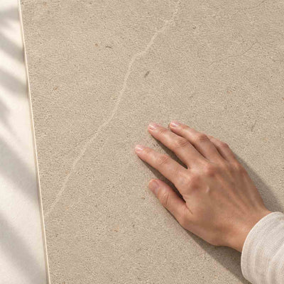 Archicross Concrete Beige Structure A (R11) 60x30cm – hand touching finely textured Structure A surface – product render