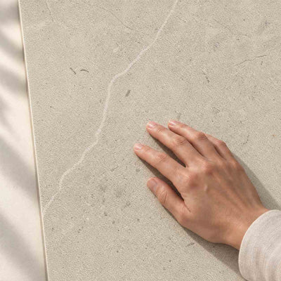 Archicross Concrete White Structure A (R11) 60x30cm – hand touching finely textured Structure A surface – product render