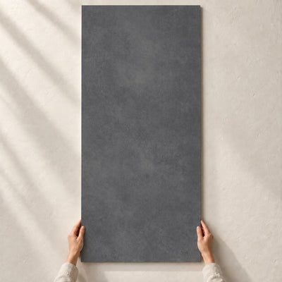 Architeq Anthracite Matt 120x60cm – full tile held in hands – product render