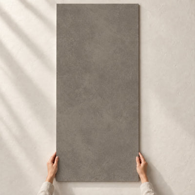 Architeq Brown Matt 120x60cm porcelain tile – full tile held in hands – product render