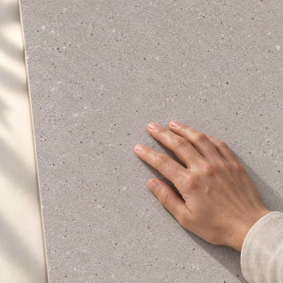 Architeq Grain Light Grey Matt 120x60cm – hand touching matt tile surface – product render