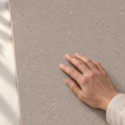 Architeq Grain Mocca Matt 120x60cm – hand touching matt tile surface – product render