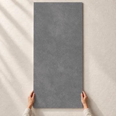 Architeq Graphite Matt 120x60cm – full tile held in hands – product render