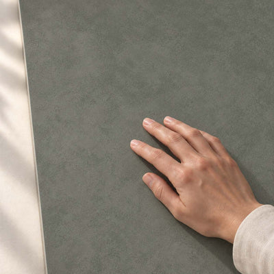 Architeq Green Matt 120x60cm porcelain tile – hand touching the matt surface – product render