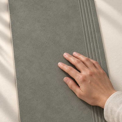 Architeq Green Step Tile Matt 30x60cm porcelain tile – hand touching the matt surface – product render