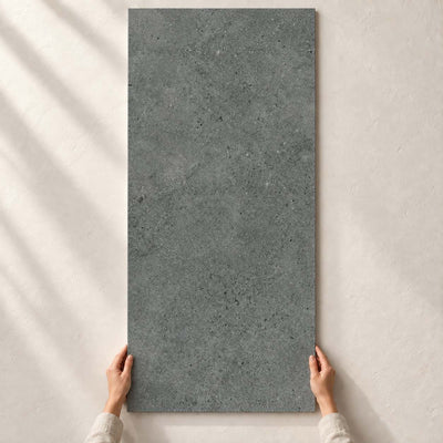 Authority Graphite Mat Porcelain Tile 120x60cm – full tile held in hands – product render