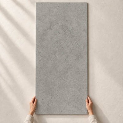 Authority Grey - Matt  Porcelain Tile 120x60cm – full tile held in hands – product render