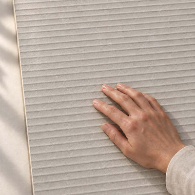 Convero Grey Decor Structure Matt 120x60cm porcelain tile render - hand touching the matt tile surface