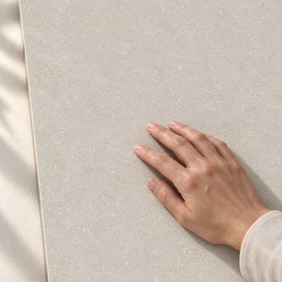 Convero Grey Matt 120x60cm – hand touching the tile surface – product render