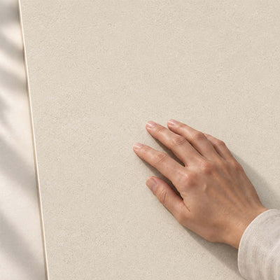 Convero Light Beige Matt 120x60cm porcelain tile render - hand touching the matt tile surface