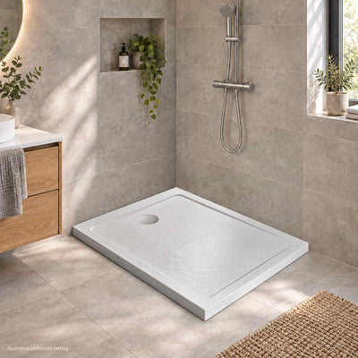 DOROS F Stone White Shower Tray in a modern bathroom without glass enclosure - illustrative setting