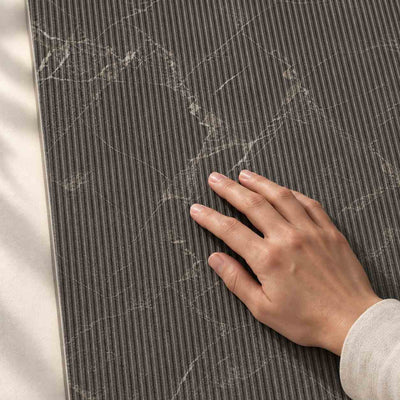 Eloria Anthracite Decor Structure Matt 120x60cm – hand touching the tile surface – product render