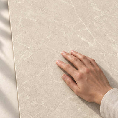 Eloria Light Beige Structure Matt 120x60cm porcelain tile – hand touching the textured surface – product render