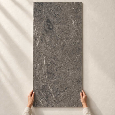 Lumeya Graphite Brush Matt 120x60cm – full tile held in hands – product render