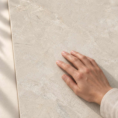 Noble Symphony Crema Matt 120x60cm – hand touching tile surface – product render