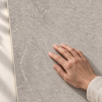 Urban Champagne Taupe Structure Matt 120x60cm – hand touching tile surface – product render