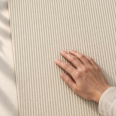 Velmero Greige Decor Structure Matt 120x60cm porcelain tile – hand touching the textured surface – product render