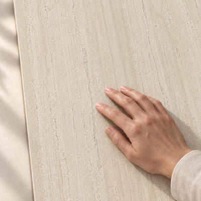 Velmero Greige Structure Matt 120x60cm – hand touching the tile surface – product render
