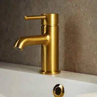 Moza Brushed Gold Low Washbasin Mixer in Bathroom 