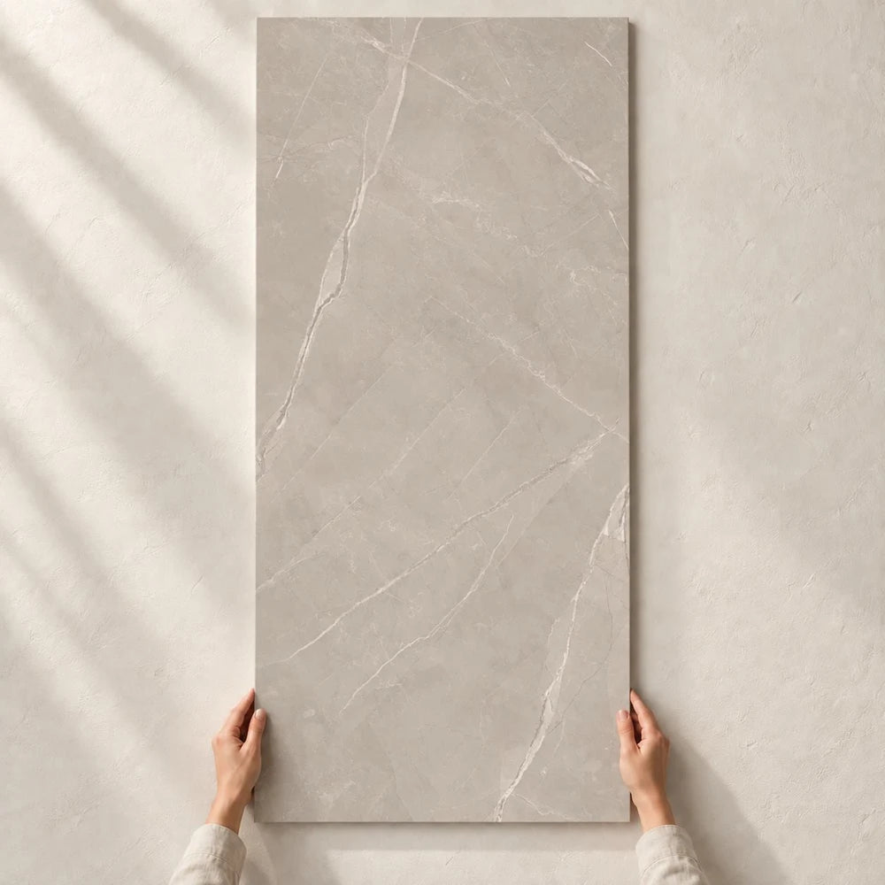 Ritual Taupe Matt tile held by hand